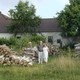 Liza Lizarraga’s parents visiting the Czech home where her father’s grandmother grew up, in 2005.